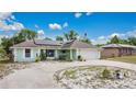 Inviting single-story home featuring well-maintained landscaping and solar panels at 432 Taylorville St, Deltona, FL 32725