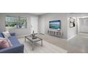 Bright living room with new paint, featuring an entertainment center and a view of the front yard at 117 Exeter Ave, Longwood, FL 32750