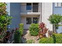Charming entryway with a decorated door and lush landscaping at 11 Escondido Cir # 110, Altamonte Springs, FL 32701