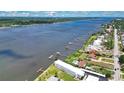 This aerial view showcases the neighborhood's waterfront condos and docks at 2901 N Halifax Ave # 220, Daytona Beach, FL 32118