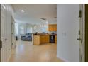 Open-concept kitchen with modern appliances and tile flooring at 305 Terrace Ridge Cir # 305, Davenport, FL 33896