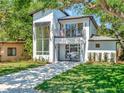 Attractive modern two-story home with an open balcony and pristine landscaping at 804 E 24Th Ave, New Smyrna Beach, FL 32169
