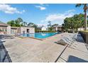 Community pool with lounge chairs, perfect for relaxation and recreation at 440 Orienta Point St, Altamonte Springs, FL 32701