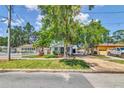 Street view of a charming home showcasing well-maintained landscaping and inviting curb appeal at 2114 Gerda Ter, Orlando, FL 32804