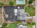Aerial view showcases the large backyard, pool, and patio area of the property at 2121 Vivada St, Orlando, FL 32803