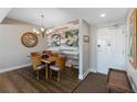 Dining area boasting a modern chandelier and attractive wall decor at 3799 S Atlantic Ave # 1006, Daytona Beach, FL 32118