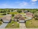 Lovely home in a community near a pond with a large, fenced yard at 5118 Luna Negra Dr, Orlando, FL 32811