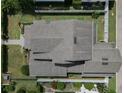 Aerial view of the home featuring a well-manicured lawn and mature landscaping at 795 W Canton Ave, Winter Park, FL 32789