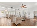 Bright, spacious living room with neutral decor and lots of natural light at 932 Campbell Ave, Lake Wales, FL 33853