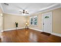 Bright living room featuring hardwood floors, natural light, and a welcoming entrance at 1333 W Yale St, Orlando, FL 32804