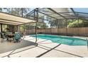 Beautiful screened-in pool and patio area, perfect for outdoor enjoyment at 1510 Jaguar Cir, Apopka, FL 32712