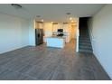 Open concept living space with recessed lighting, modern appliances, and tile flooring at 16464 Happy Eagle Dr, Clermont, FL 34714