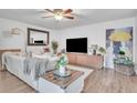 Comfortable living room showcasing modern decor and sleek entertainment center at 2329 Oak Park Way # 204, Orlando, FL 32822