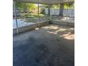 Spacious screened-in patio with a concrete floor, perfect for outdoor entertaining at 435 N Observatory Dr, Orlando, FL 32835
