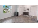 Bright entryway with tile flooring, a large window, and modern furnishings and decor at 2747 Slash Way, St Cloud, FL 34771