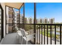 Relax on your screened in balcony and enjoy the views! at 14501 Grove Resort Ave # 1441, Winter Garden, FL 34787