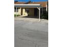 Charming townhouse with a covered carport and well-maintained front yard at 2218 Abbey Rd, Winter Haven, FL 33880