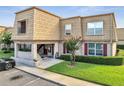 Charming condo with unique architectural features and manicured landscaping, plus a parking space at 200 Saint Andrews Blvd # 2306, Winter Park, FL 32792
