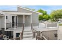 Two-story condo with a private balcony and deck, offering a stylish outdoor living space at 5125 Cypress Creek Dr # 2, Orlando, FL 32811