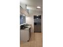 Well-equipped kitchen featuring stainless steel appliances, granite countertops, and ample cabinet space at 2404 Timbercreek E Loop, Lakeland, FL 33805