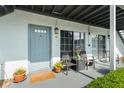 Comfortable front patio with a cozy seating area, perfect for relaxing outdoors at 4820 S Conway Rd # 131, Orlando, FL 32812