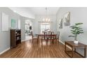 Inviting dining room with stylish decor and warm lighting, perfect for Gathering meals at 3016 Samosa Hill Cir, Clermont, FL 34714