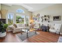 Bright living room with large windows, high ceilings, and elegant decor at 9915 Kona Isle Ct, Orlando, FL 32817