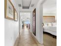 Hallway with decorative tile flooring leading to the bedrooms and living spaces at 1370 Centre Court Ridge Dr # 204, Reunion, FL 34747