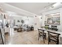 Bright living room featuring an open concept design, tile floors, and lots of natural light at 206 E South St # 3008, Orlando, FL 32801