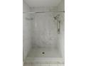 Modern bathroom shower featuring elegant tile work and contemporary fixtures at 8347 Willowwood St, Orlando, FL 32818