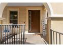 Inviting entrance with welcome mat, chairs, and a charming welcome sign at 3333 Messina Dr, Lake Mary, FL 32746