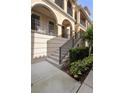 Charming three-story townhouse with private balconies, landscaped yard and a welcoming entrance at 3333 Messina Dr, Lake Mary, FL 32746
