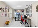 Bright home office with a large window and decorative accents at 507 Raymond Ave, Frostproof, FL 33843
