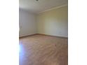 Bright bedroom with wood flooring and ample natural light at 5441 Arpana Dr, Orlando, FL 32839