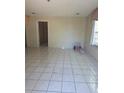 Spacious living room featuring tile floors and natural light, ready for personal touches at 5441 Arpana Dr, Orlando, FL 32839