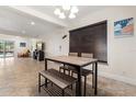 Open dining room with a table, lots of light and direct access to an outdoor living area at 5606 Eggleston Ave, Orlando, FL 32810