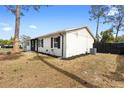 Charming single-story home with new landscaping and a fenced-in yard at 14120 Rutgers Ave, Orlando, FL 32826