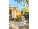 Inviting home exterior with lush landscaping and a welcoming walkway at 600 Lake St, Fruitland Park, FL 34731