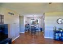 Cozy dining area featuring a round table, stylish chairs, and modern decor at 11137 Acme Dr # 207A, Orlando, FL 32825