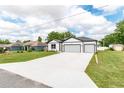 Attractive single-Gathering home with a spacious driveway and well-maintained landscaping at 13312 Sw 41St Ct, Ocala, FL 34473