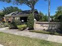 Charming community building at Flagship Park with outdoor seating and lush landscaping at 2530 San Jacinto Cir # 2530, Sanford, FL 32771