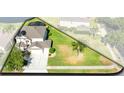 Expansive property featuring a well-maintained lawn, mature trees, and inviting curb appeal at 2704 Gorst Rd, Winter Garden, FL 34787