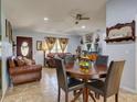 Spacious living and dining area with neutral walls and tile flooring at 929 Monroe Harbor Pl, Sanford, FL 32773
