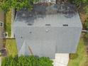 Aerial view of a well maintained roof displaying clean lines, proper ventilation, and durable shingles at 1156 Brandy Lake View Cir, Winter Garden, FL 34787