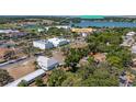 Aerial view of the property showing its proximity to Lake Florence and Montverde Academy at 17409 Division St, Montverde, FL 34756