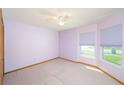 Cozy bedroom with natural light, carpeted floors and closet at 4216 Cricket Hollow Cv, Casselberry, FL 32707
