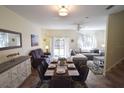 Open-concept living and dining area with stylish furnishings and natural light creates an inviting space at 626 Verona Ave, Davenport, FL 33897