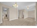 Spacious living room featuring tile flooring and neutral paint tones at 14517 Black Lake Preserve St, Winter Garden, FL 34787