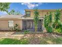 Relaxing screened patio with lush backyard, ideal for outdoor enjoyment and privacy at 1523 Casa Park Cir, Winter Springs, FL 32708