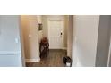 Cozy foyer featuring a stylish console table and elegant decor at 3998 Bedford Ave, Winter Haven, FL 33884